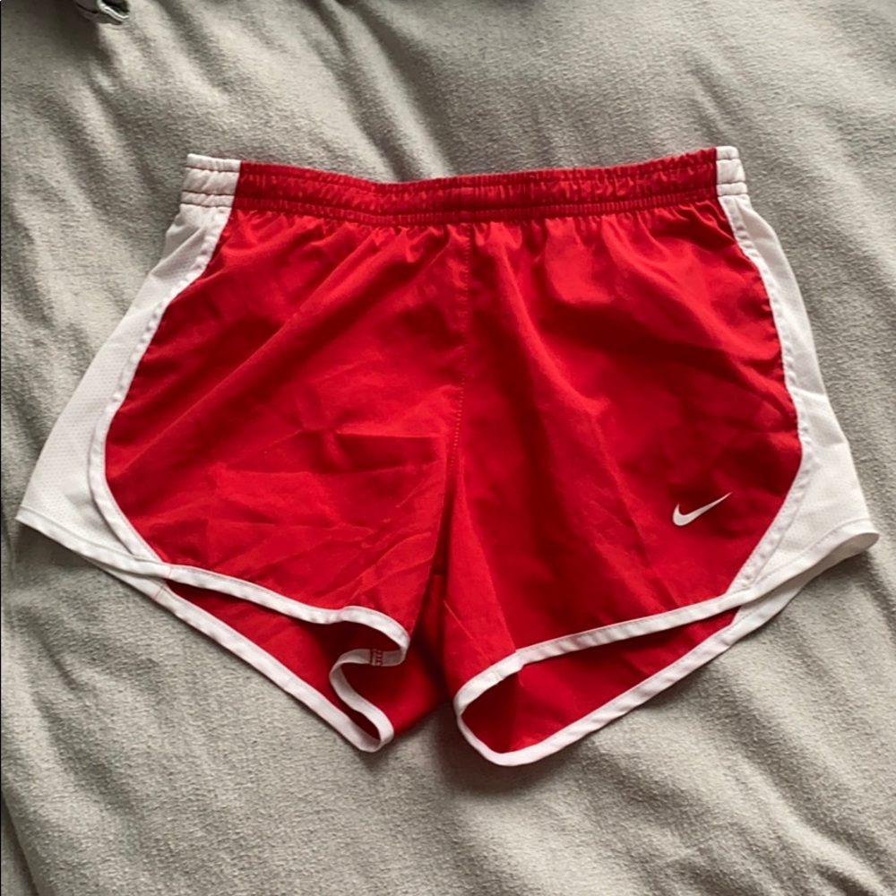 Red Nike shorts